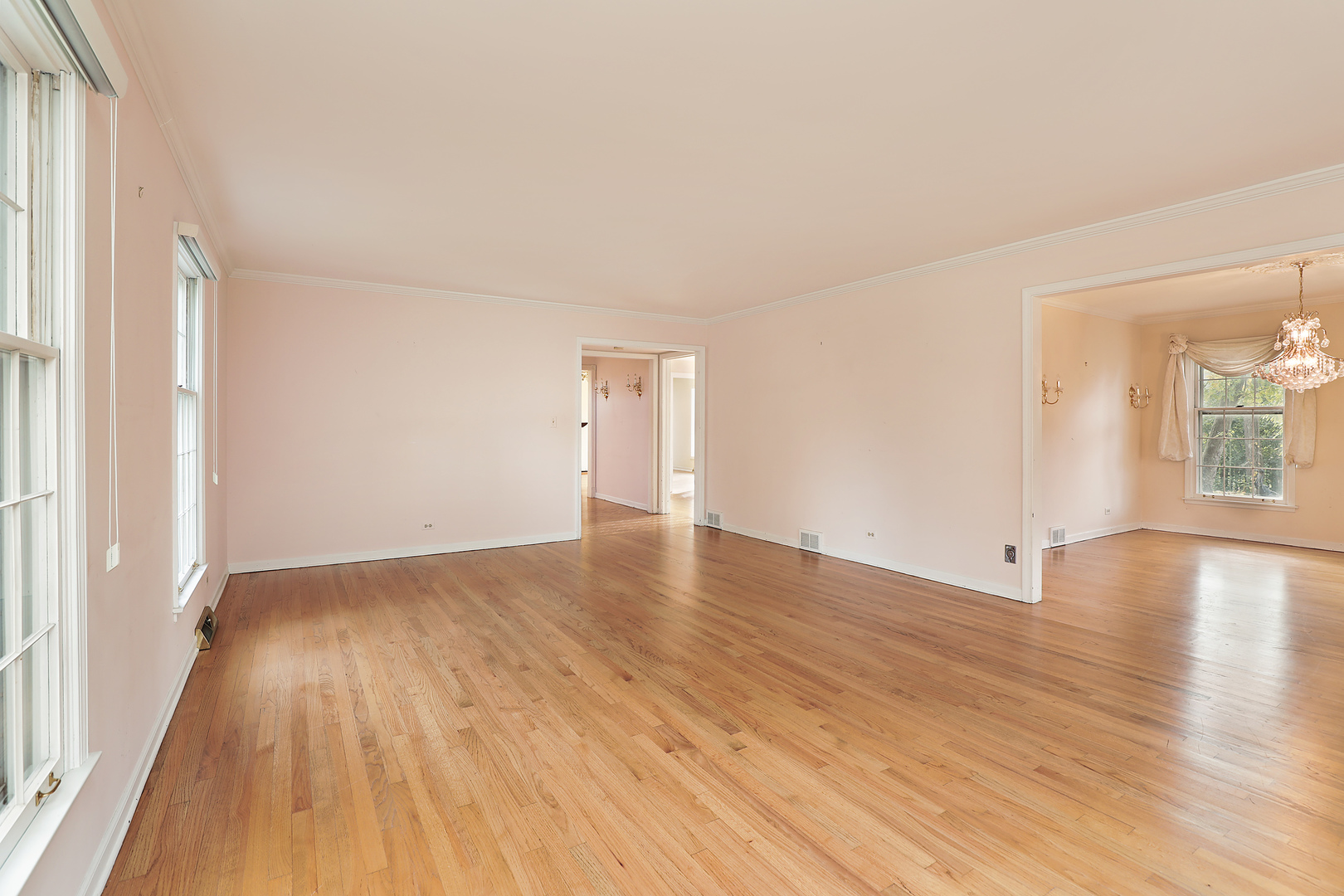 3815 Bordeaux Drive Northbrook, IL 60062 - Photo 6 of 56 wooden floor in an empty room with a window
