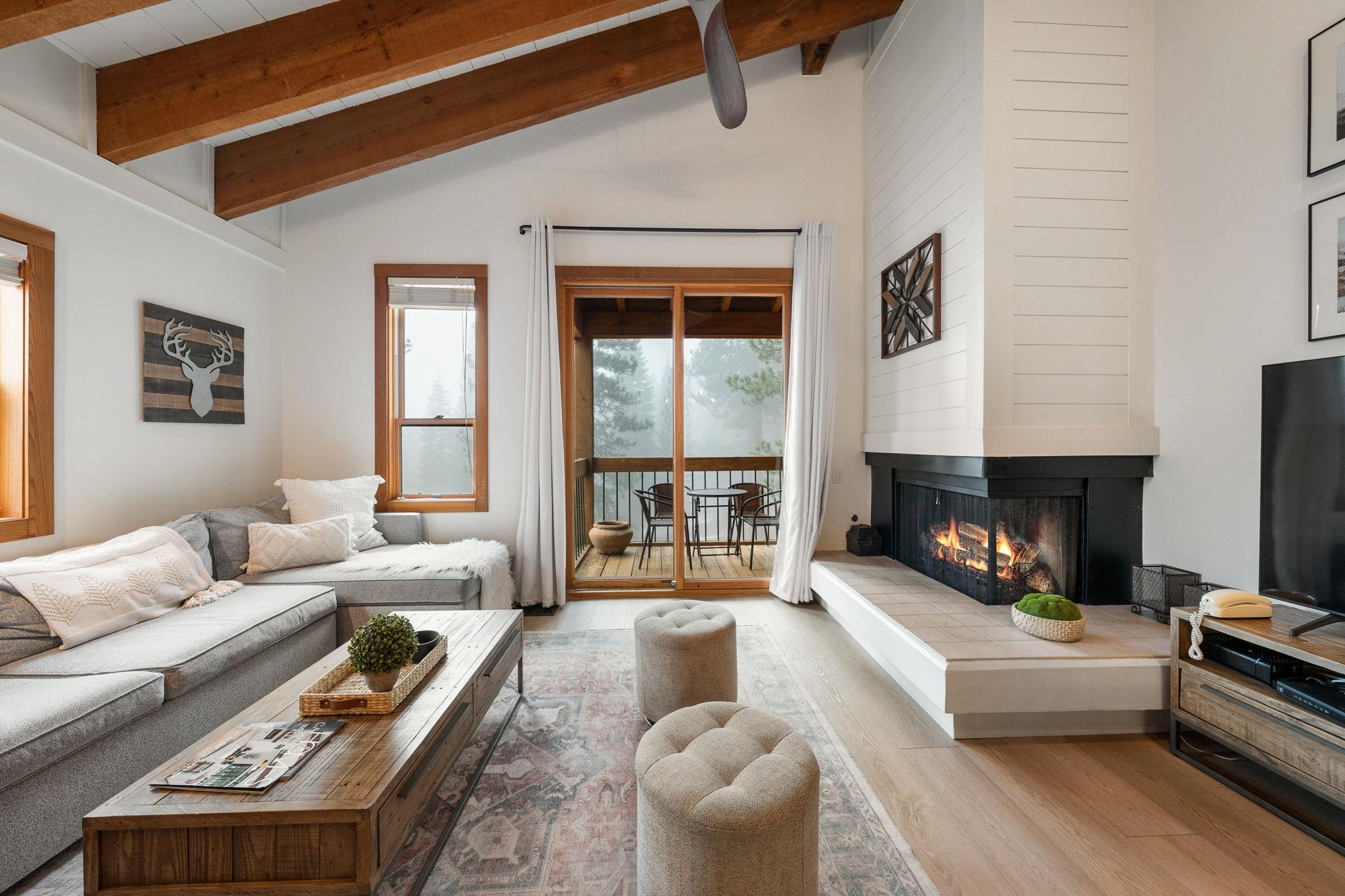 5085 Gold Bend Truckee, CA 96161 - Photo 11 of 22 a living room with furniture fireplace and a fireplace
