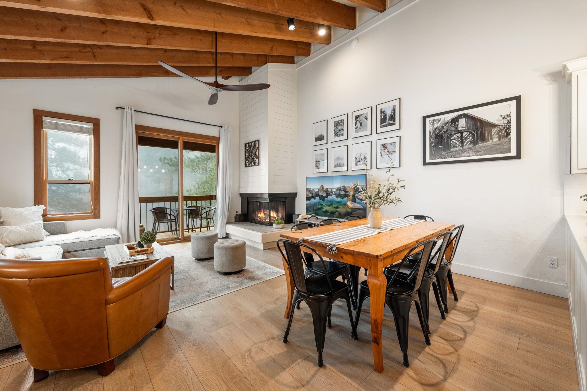 5085 Gold Bend Truckee, CA 96161 - Photo 13 of 22 a dining room with furniture a chandelier and wooden floor