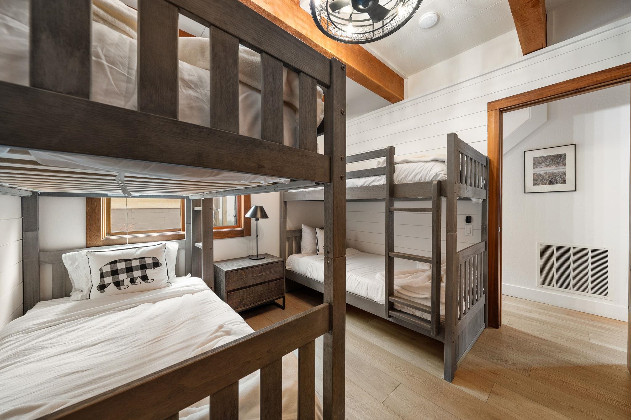 5085 Gold Bend Truckee, CA 96161 - Photo 8 of 22 a bedroom with a bed a mirror and a window