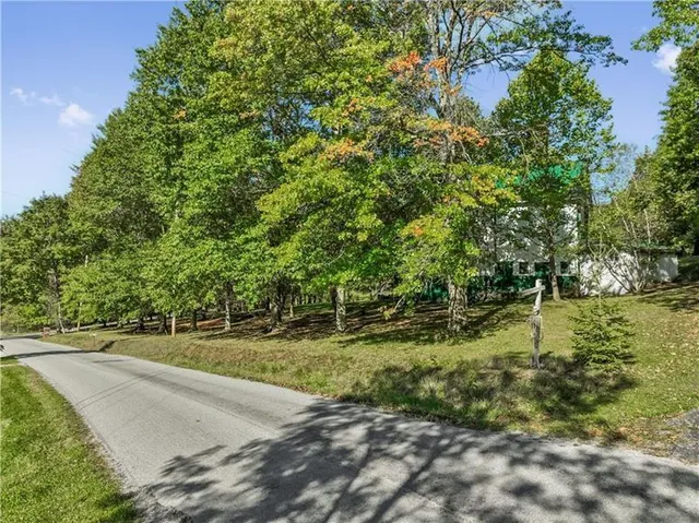 a black and white photo of a bathroom