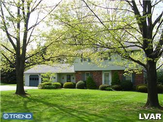 2310 Rickert Road Perkasie, PA 18944 - Photo 1 of 8 front view of a house with a yard