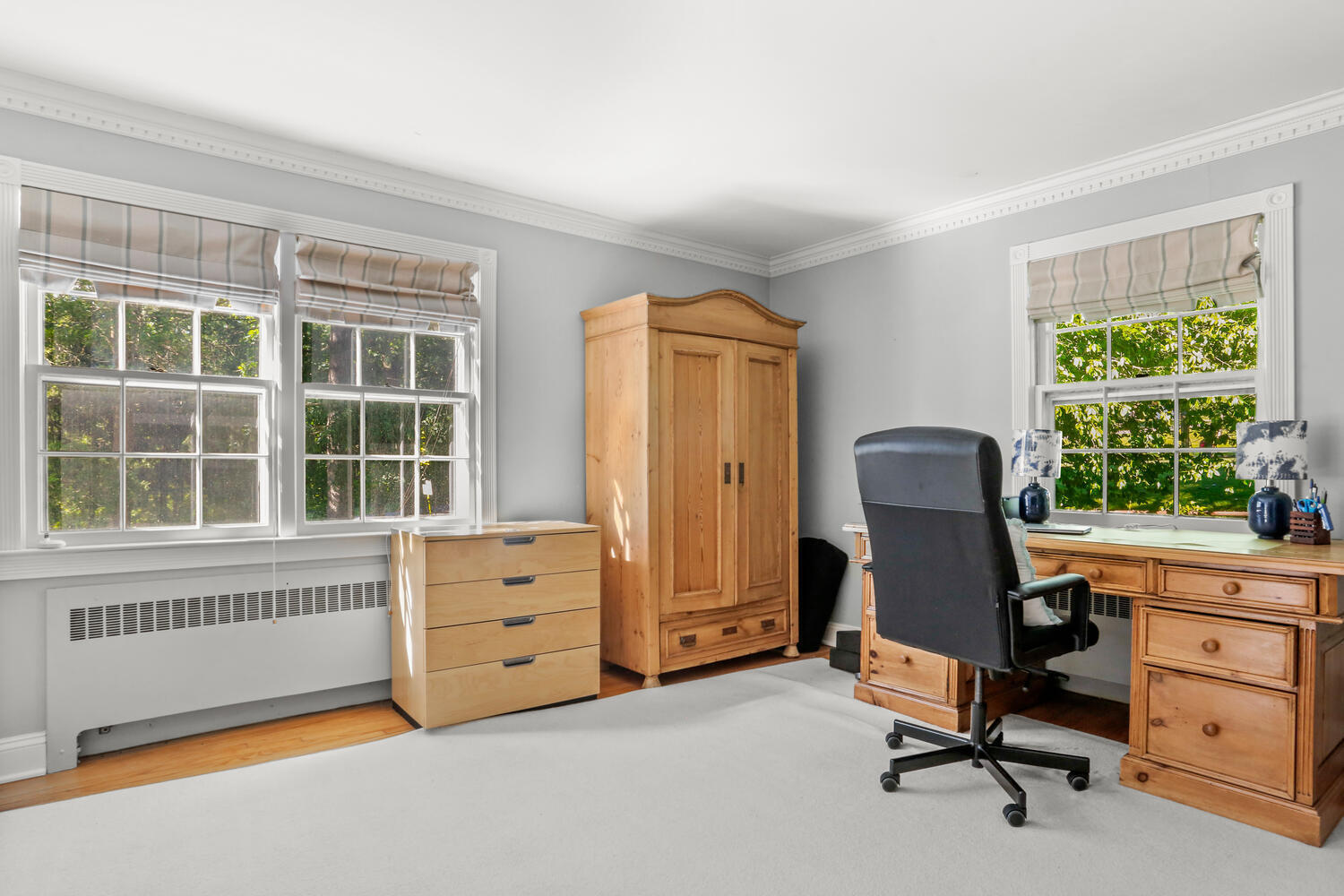 110 Gower Road New Canaan, CT 06840 - Photo 14 of 39 a view of a workspace with furniture and a window