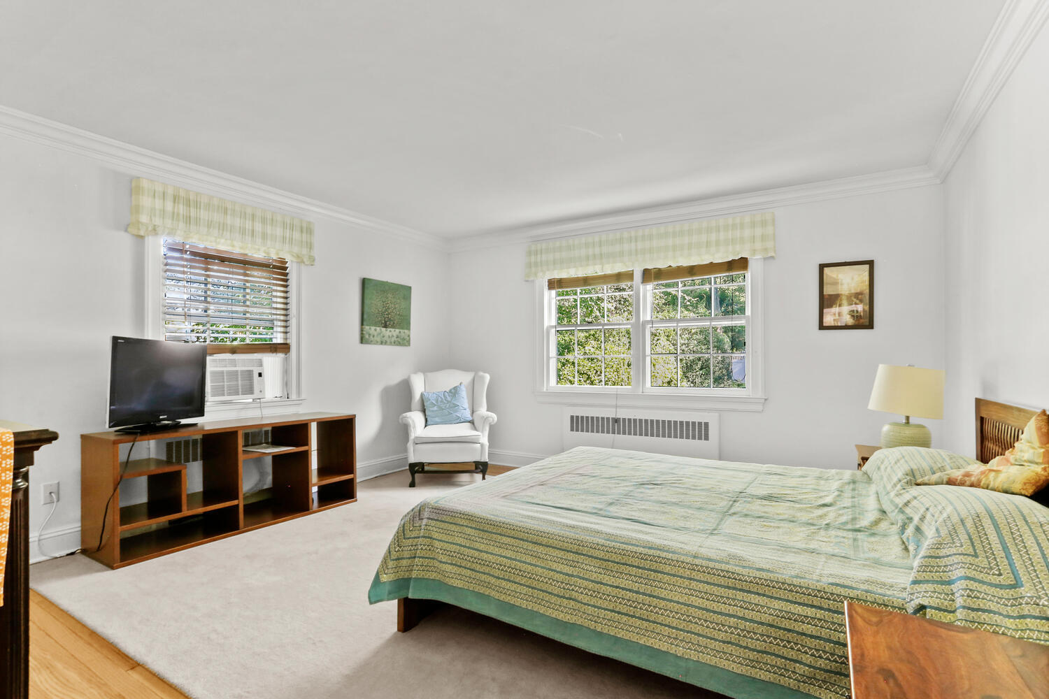 110 Gower Road New Canaan, CT 06840 - Photo 15 of 39 a bedroom with a bed and a flat screen tv