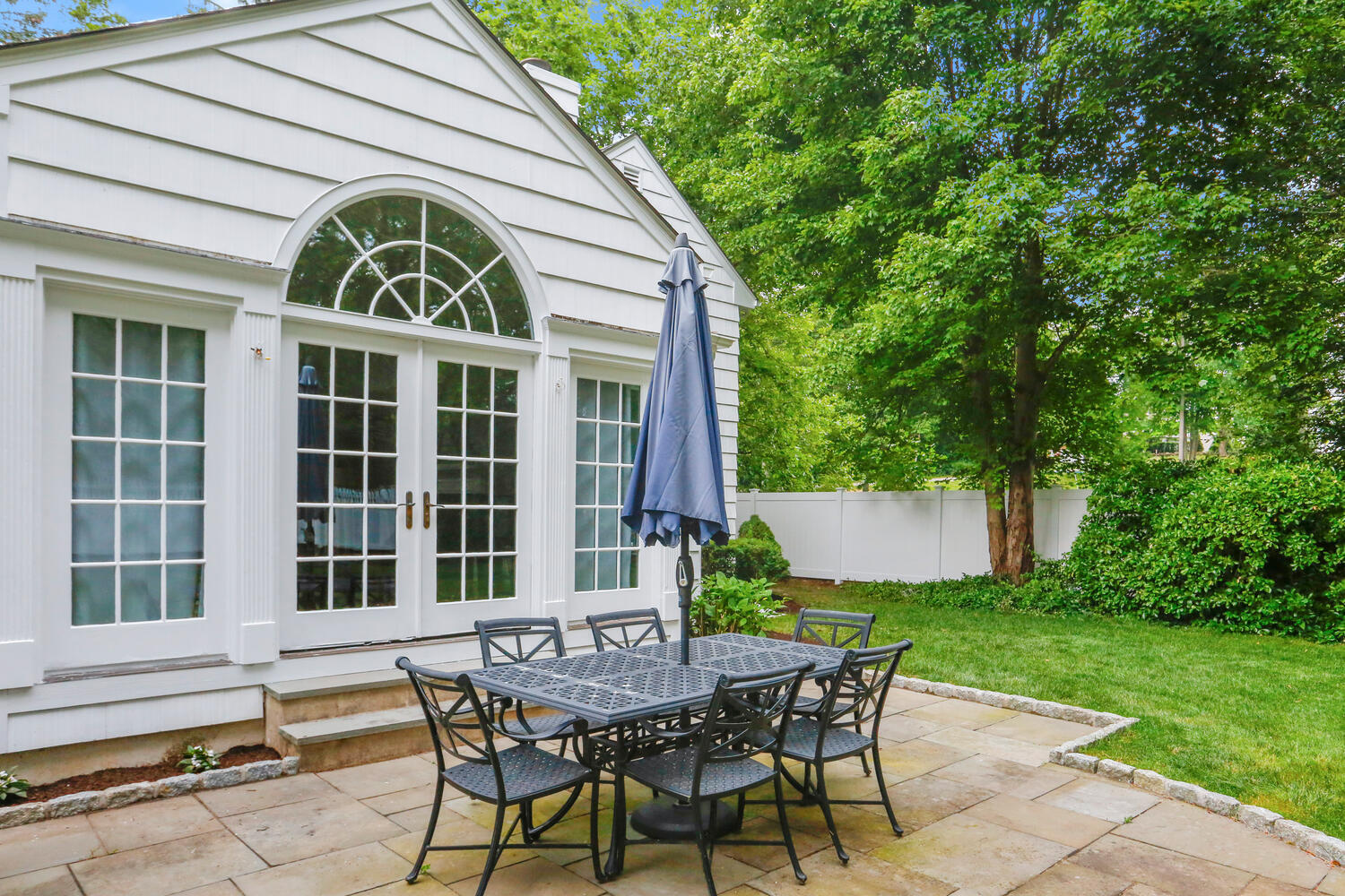 110 Gower Road New Canaan, CT 06840 - Photo 31 of 39 a view of a house with backyard and sitting area