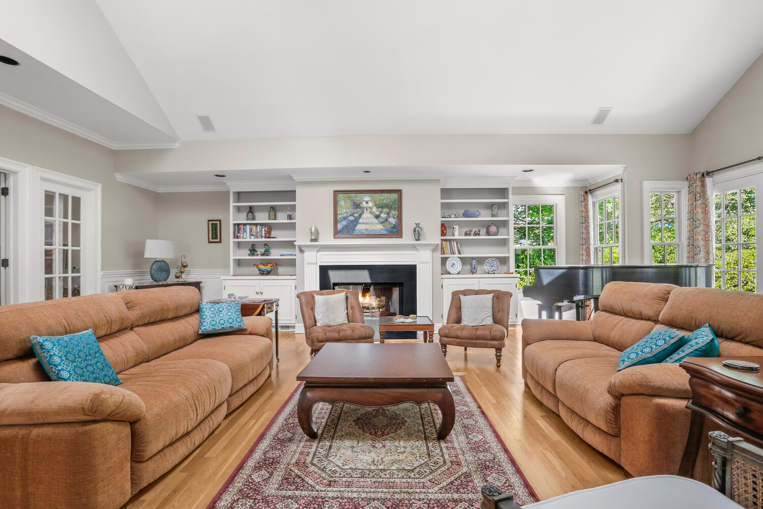 110 Gower Road New Canaan, CT 06840 - Photo 5 of 39 a living room with furniture wooden floor and a fireplace
