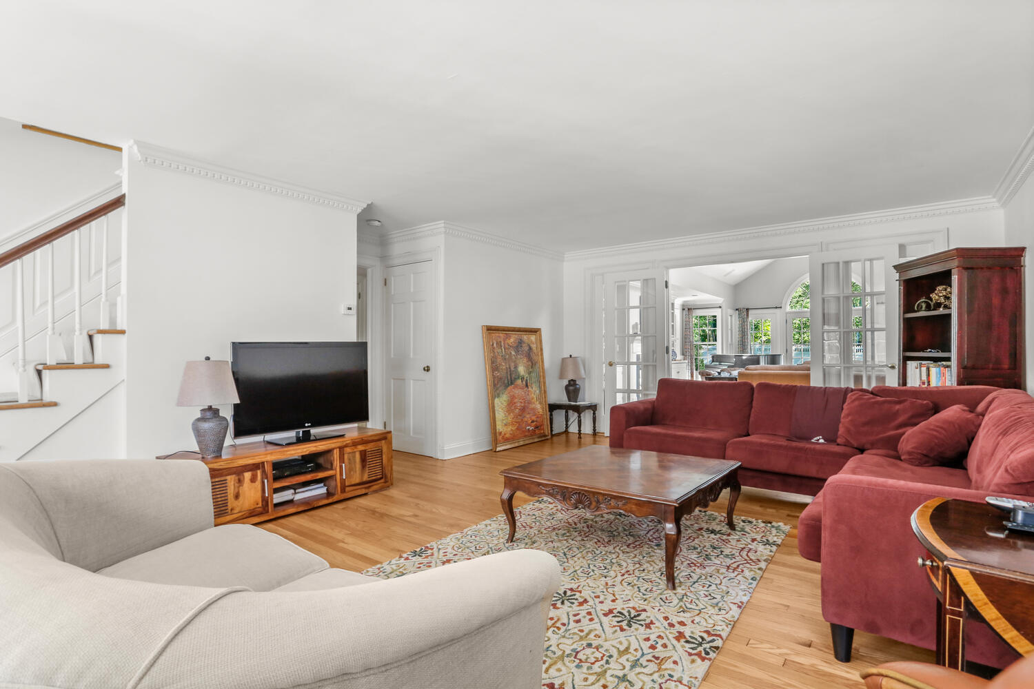 110 Gower Road New Canaan, CT 06840 - Photo 8 of 39 a living room with furniture a flat screen tv and a window