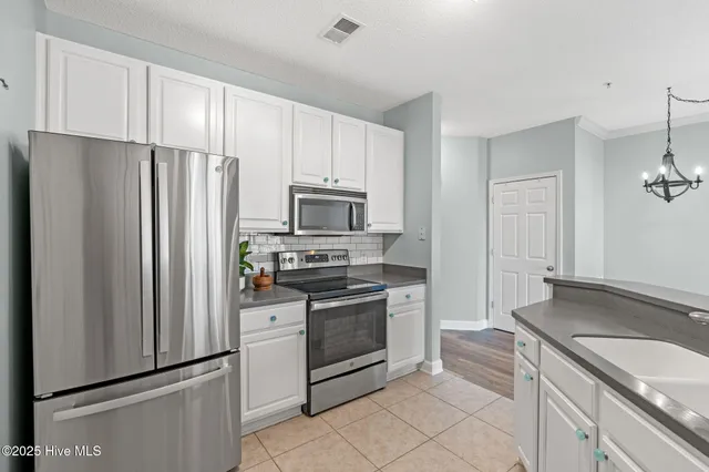 $409,000 | 1135 Park Road Southwest, Unit 1203, Sunset Beach, NC 28468