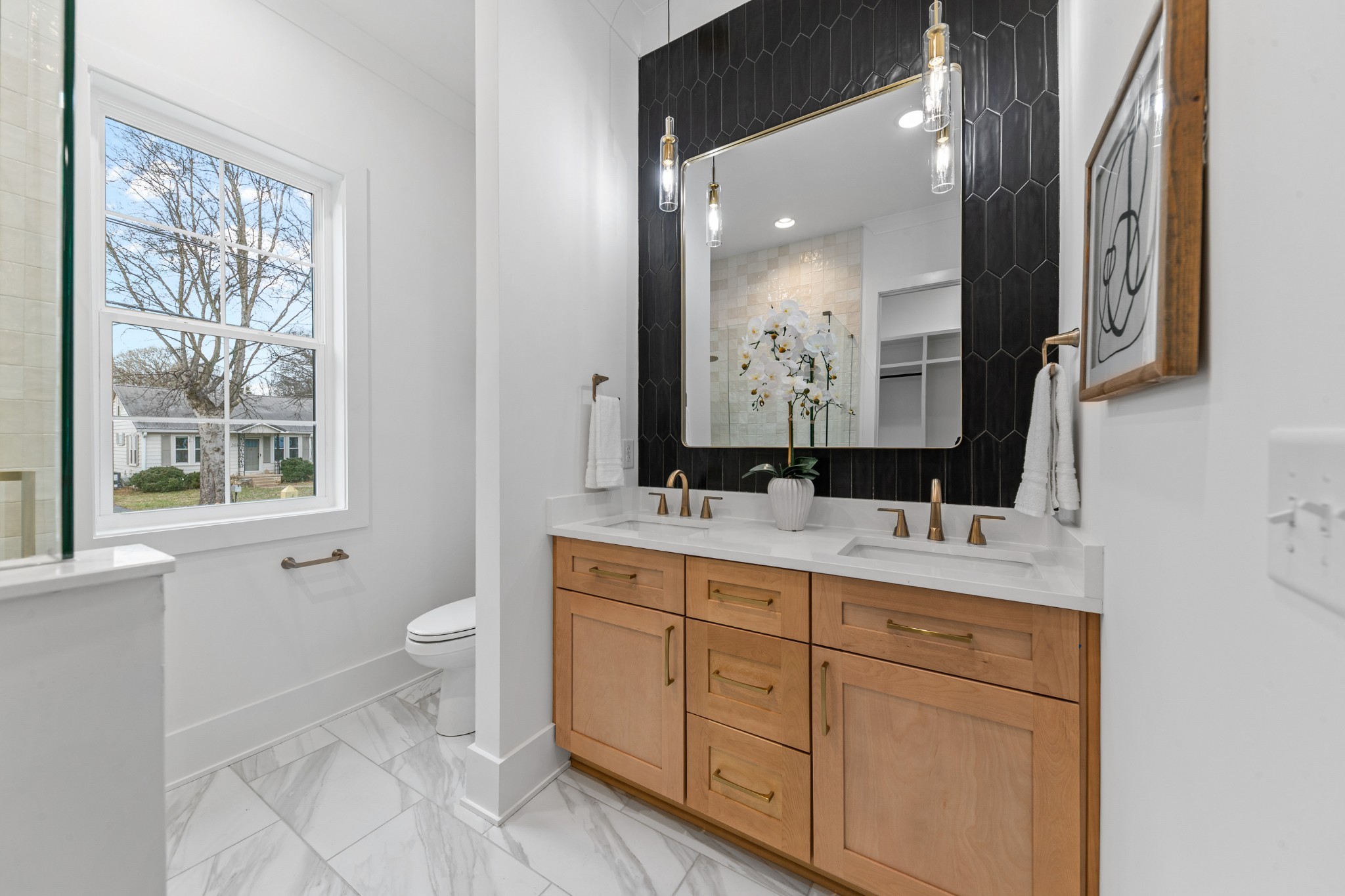 414 Conant Street Columbia, TN 38401 - Photo 21 of 48 a bathroom with a double vanity sink toilet and mirror