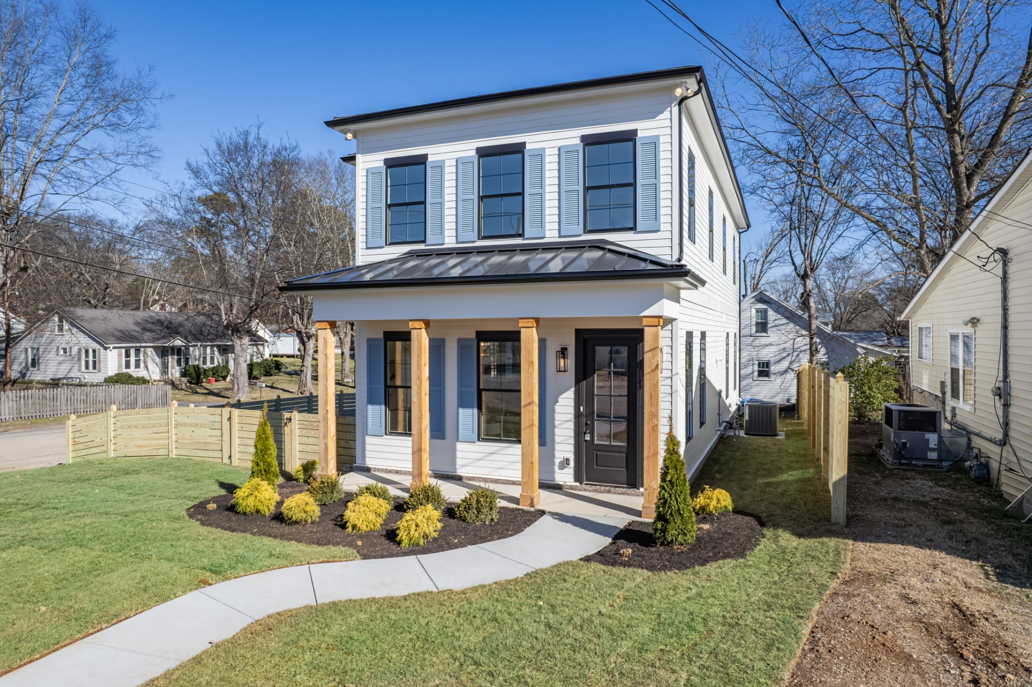 414 Conant Street Columbia, TN 38401 - Photo 48 of 48 a front view of a house with garden and patio