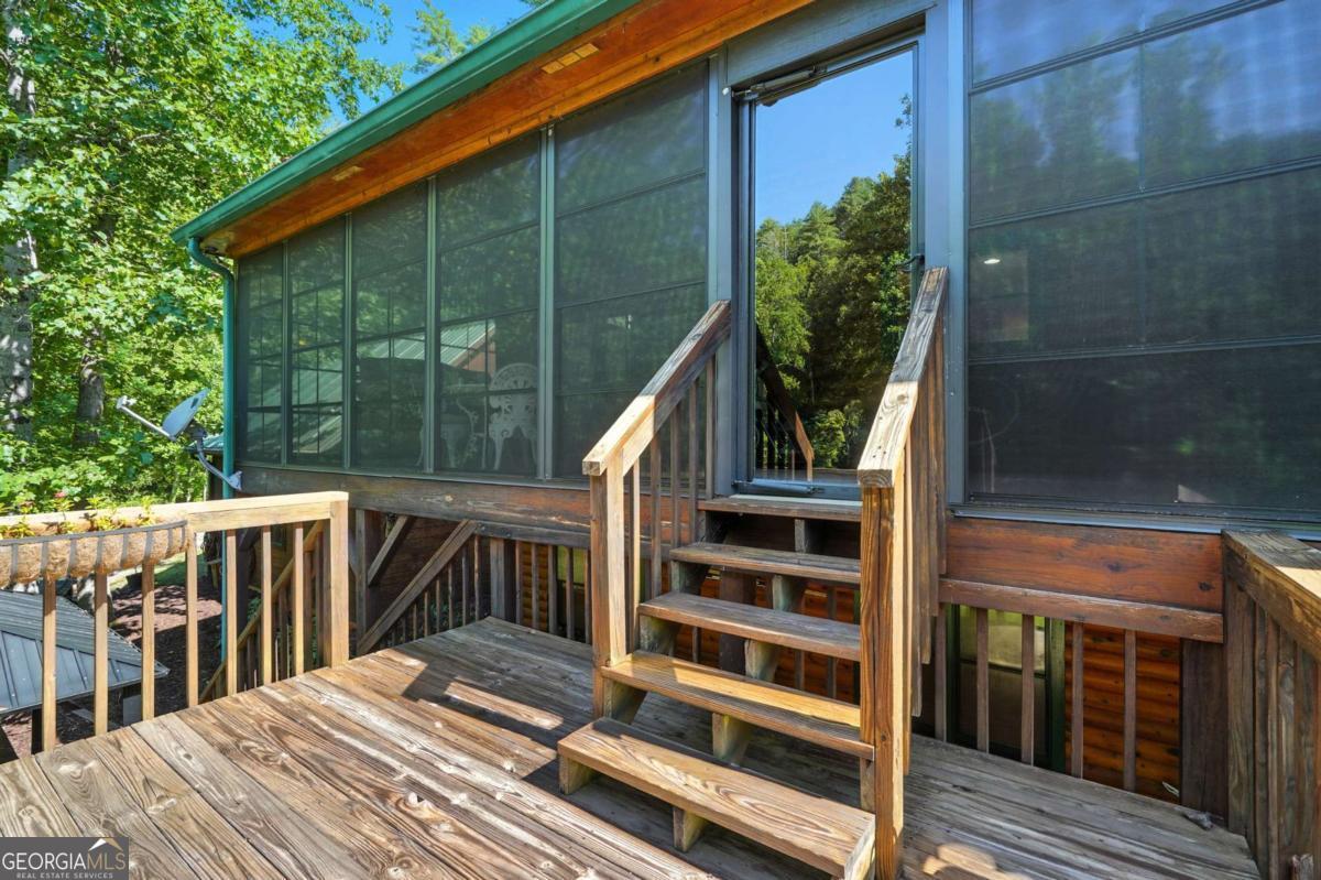 772 Rickman Airfield Road Clayton, GA 30525 - Photo 42 of 64 a view of balcony with wooden floor and fence