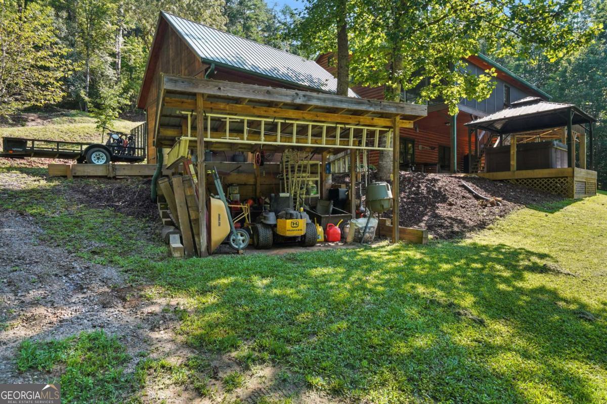 772 Rickman Airfield Road Clayton, GA 30525 - Photo 50 of 64 a view of outdoor space yard and deck