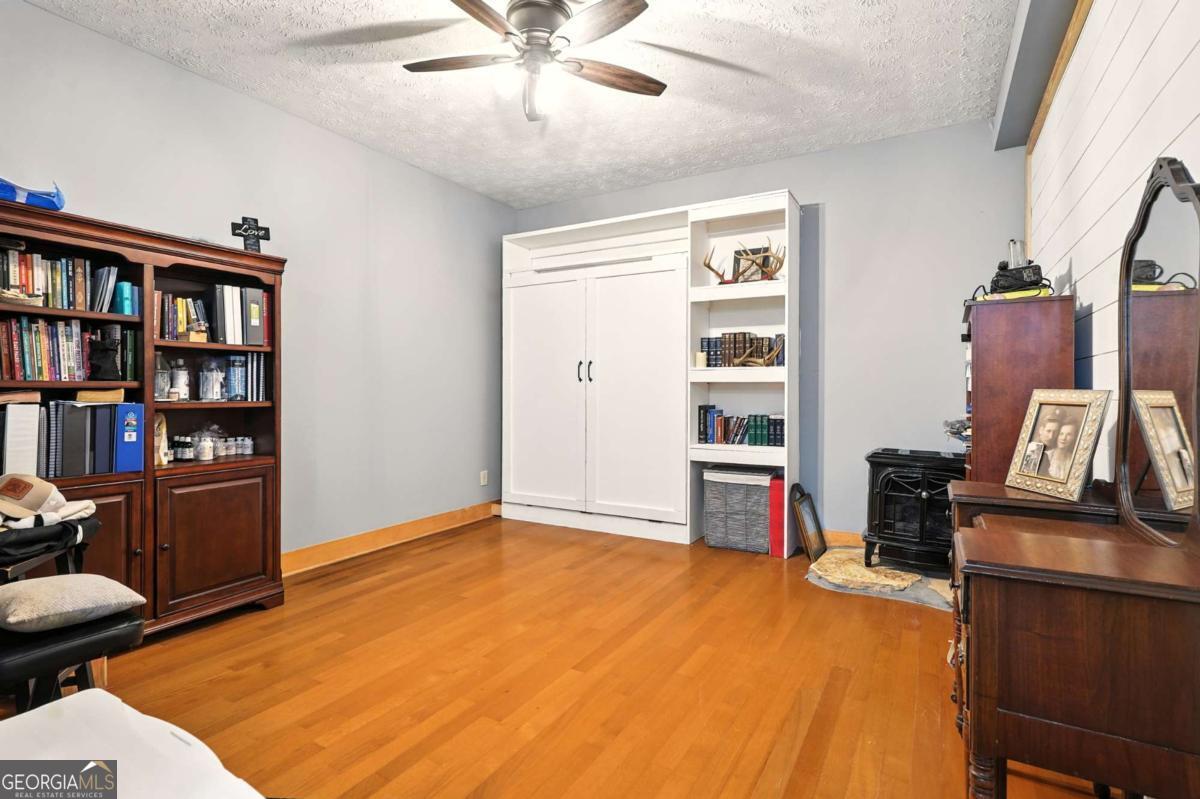 772 Rickman Airfield Road Clayton, GA 30525 - Photo 52 of 64 a view of a livingroom with furniture and staircase