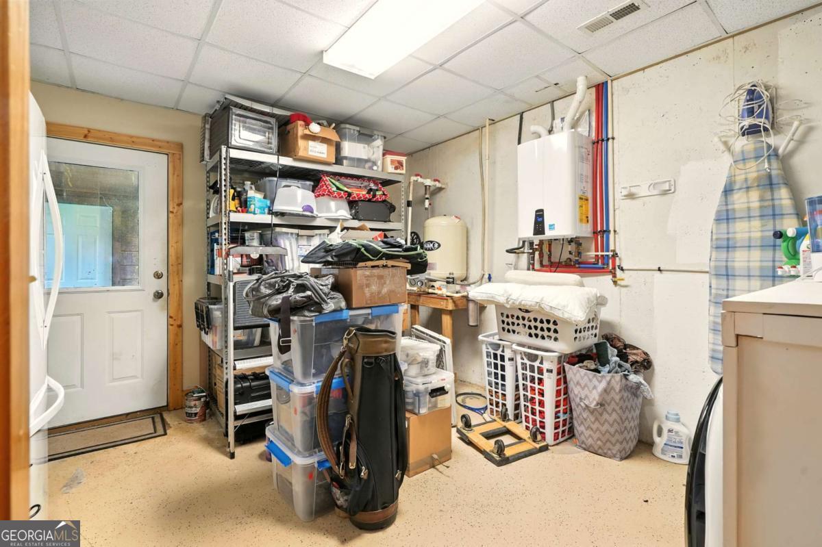 772 Rickman Airfield Road Clayton, GA 30525 - Photo 61 of 64 a view of a room with gym equipment