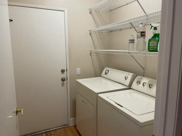 a utility room with dryer and washer