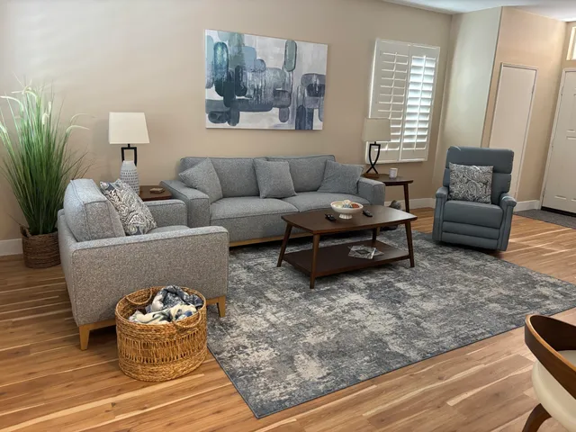 a living room with furniture and a couch