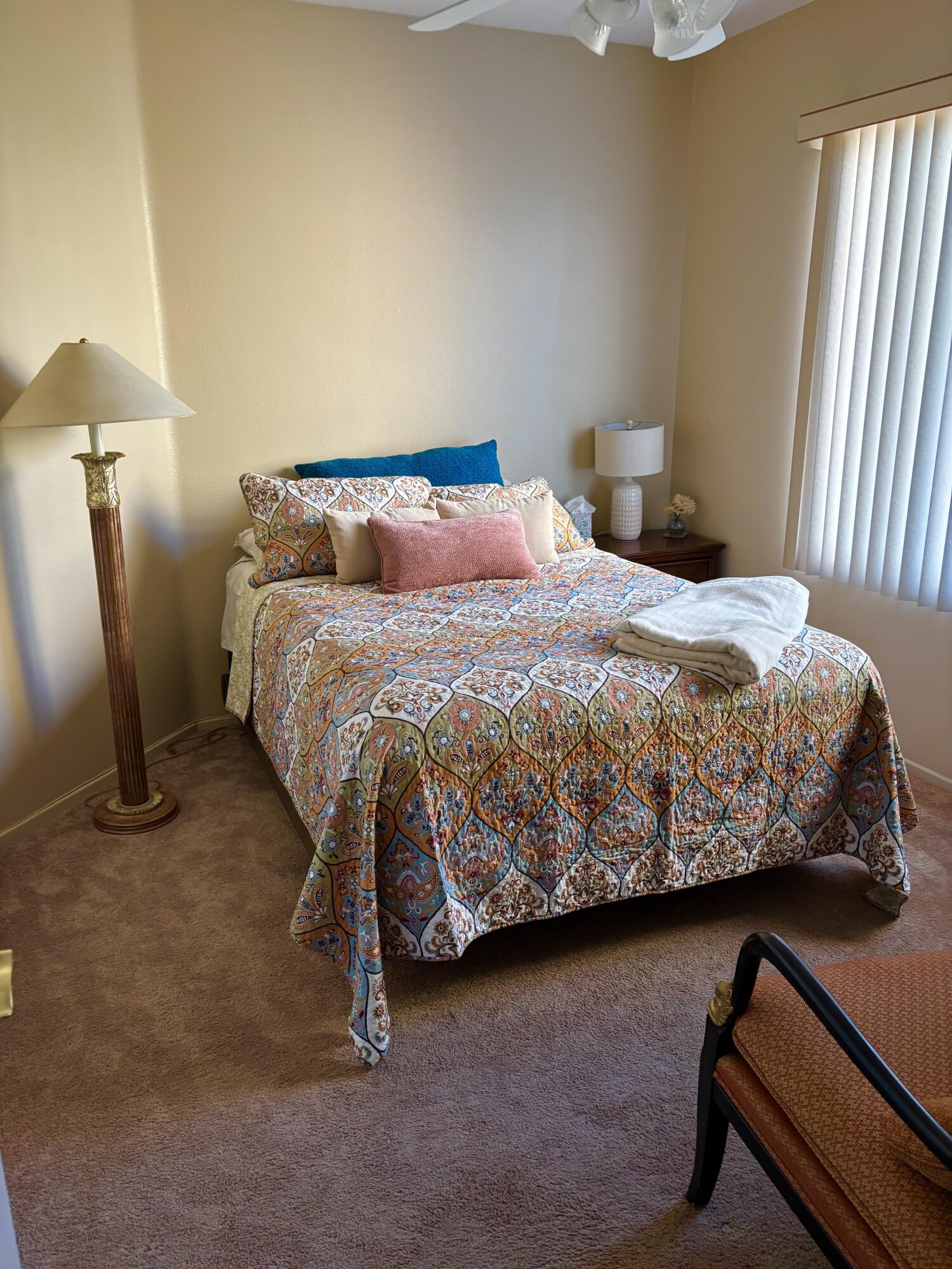 78724 Palm Tree Avenue Palm Desert, CA 92211 - Photo 7 of 14 a bedroom with a bed chair and a lamp on table