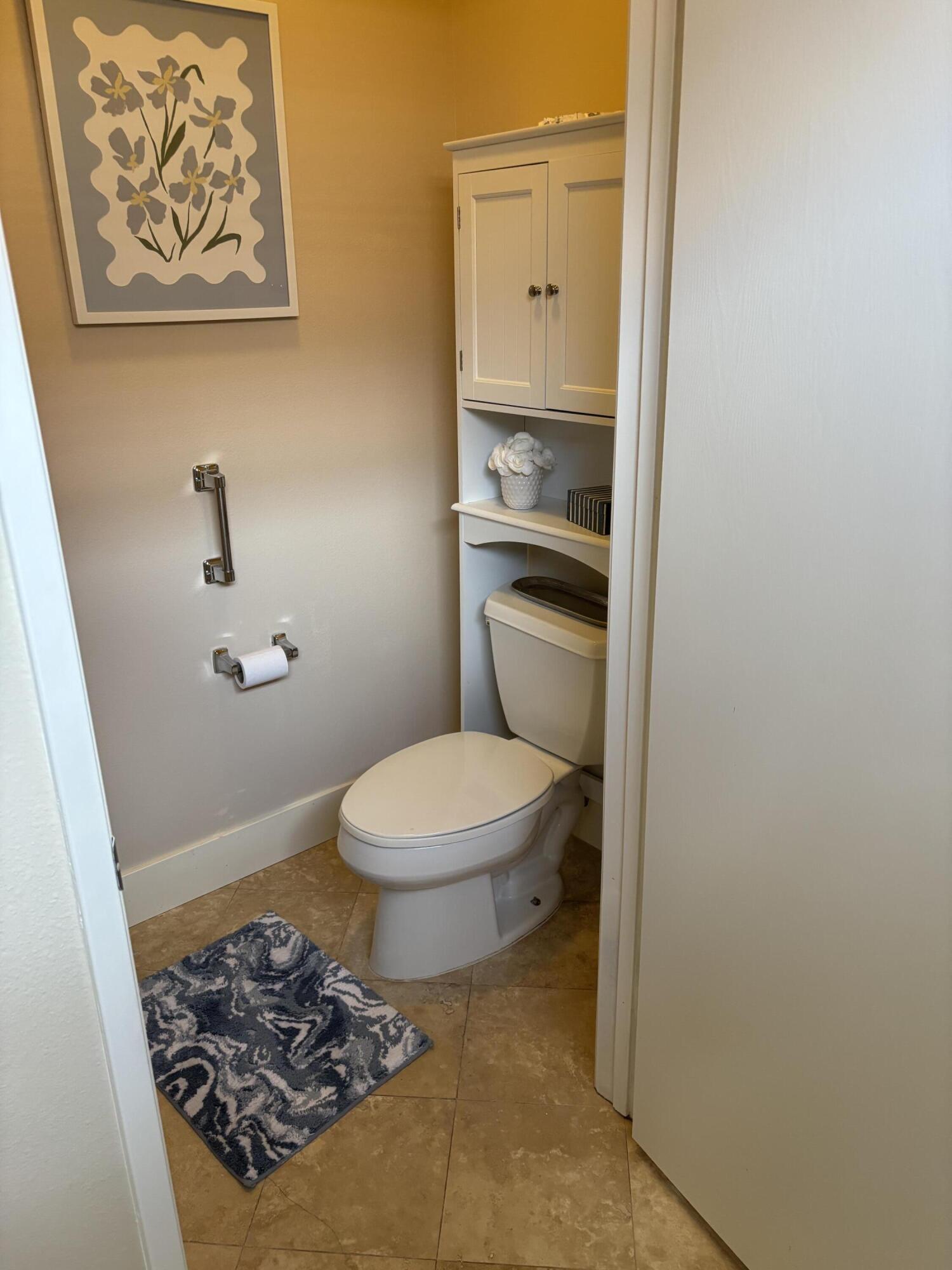 78724 Palm Tree Avenue Palm Desert, CA 92211 - Photo 9 of 14 a bathroom with a toilet and a shower