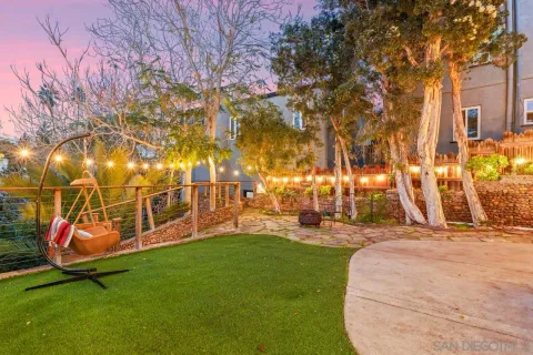 a view of yard with swimming pool