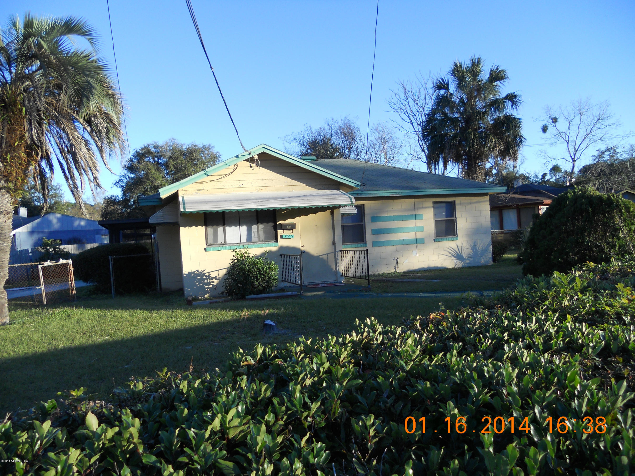 3705 Freeman Road Jacksonville, FL 32207 - Photo 2 of 2 a front view of a house with a garden