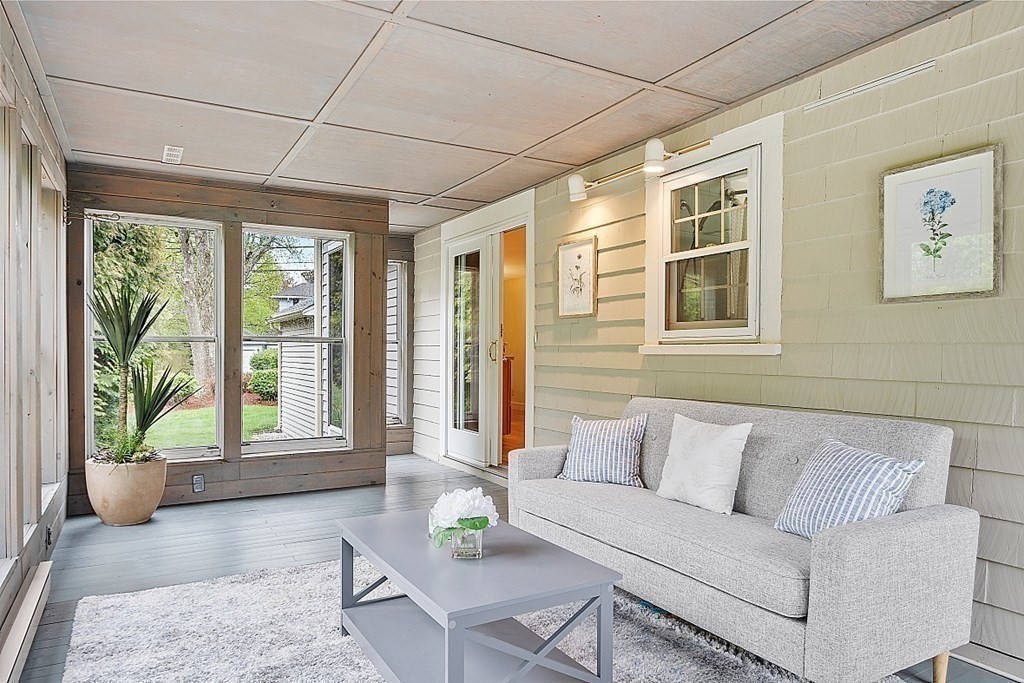 5 Gleason Road Lexington, MA 02420 - Photo 11 of 32 a living room with furniture and floor to ceiling windows