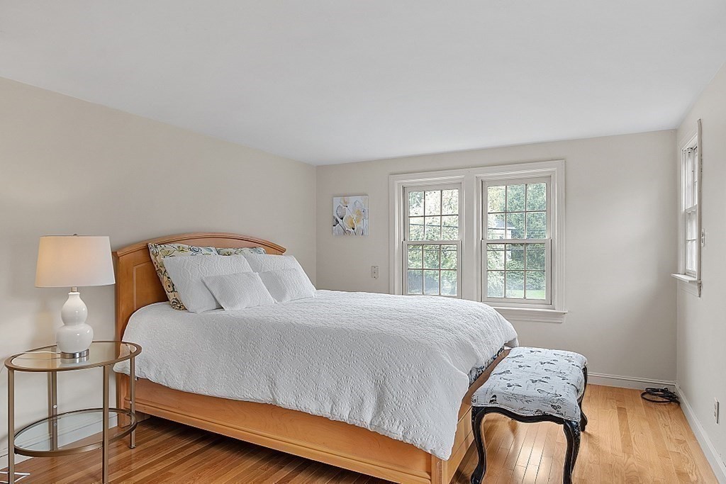5 Gleason Road Lexington, MA 02420 - Photo 13 of 32 a bedroom with a bed and window