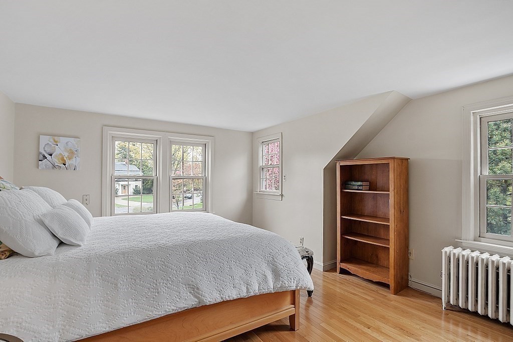5 Gleason Road Lexington, MA 02420 - Photo 14 of 32 a bedroom with a bed and a window