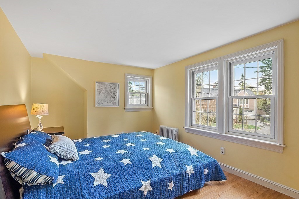 5 Gleason Road Lexington, MA 02420 - Photo 15 of 32 a bedroom with a bed and a window
