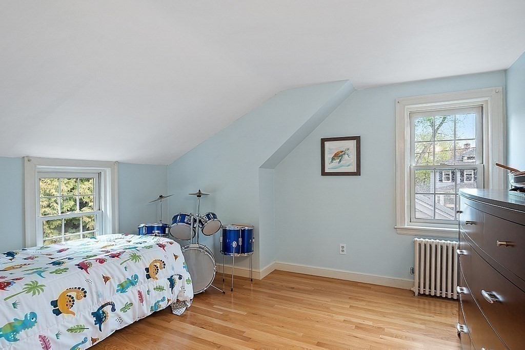 5 Gleason Road Lexington, MA 02420 - Photo 19 of 32 a bedroom with a bed and a window