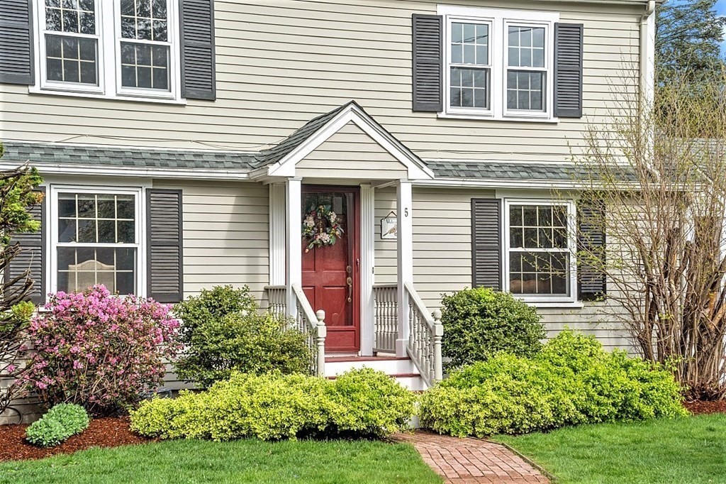 5 Gleason Road Lexington, MA 02420 - Photo 2 of 32 a front view of a house with garden