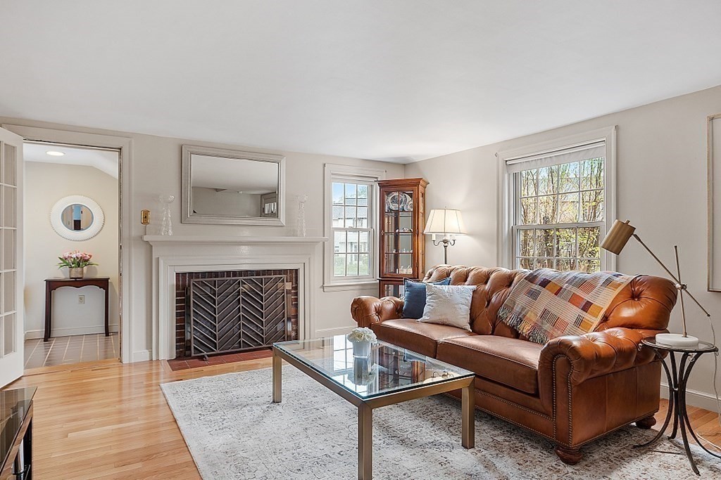 5 Gleason Road Lexington, MA 02420 - Photo 4 of 32 a living room with furniture and a fireplace