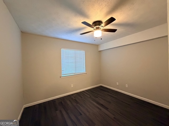 3810 Kensingwood Trace Decatur, GA 30032 - Photo 11 of 16 a view of an empty room with wooden floor and a window