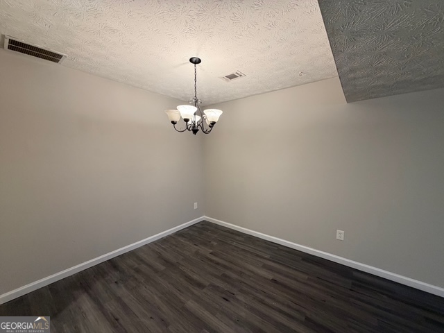 3810 Kensingwood Trace Decatur, GA 30032 - Photo 16 of 16 a view of a room with wooden floor and chandelier fan