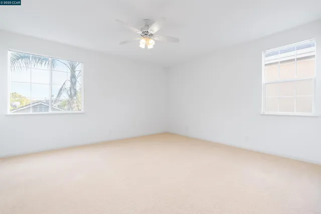 an empty room with windows