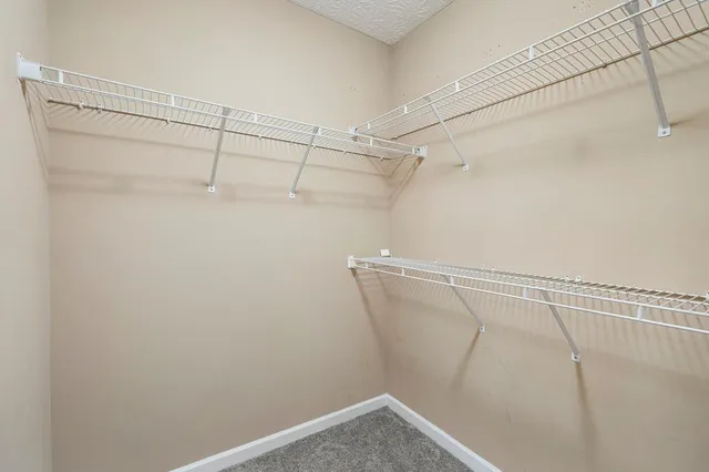 a view of a room with racks on the wall