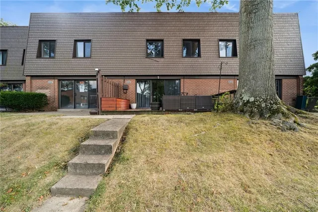 an aerial view of a city with lots of residential buildings