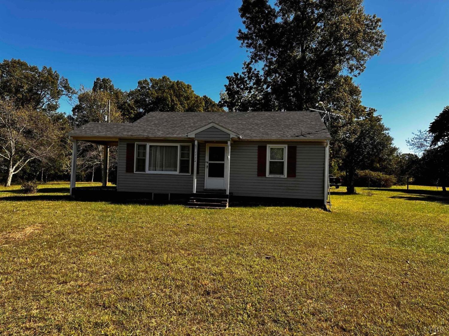 1724 Stone Mill Road Hurt, VA 24563 - Photo 1 of 37 a front view of a house with yard