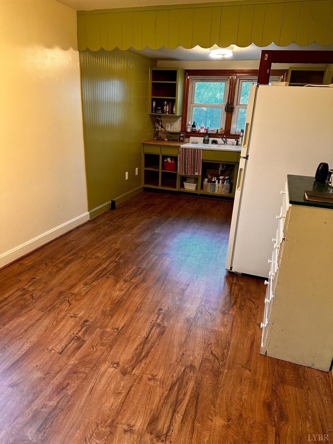 1724 Stone Mill Road Hurt, VA 24563 - Photo 14 of 37 a view of living room with furniture and wooden floor