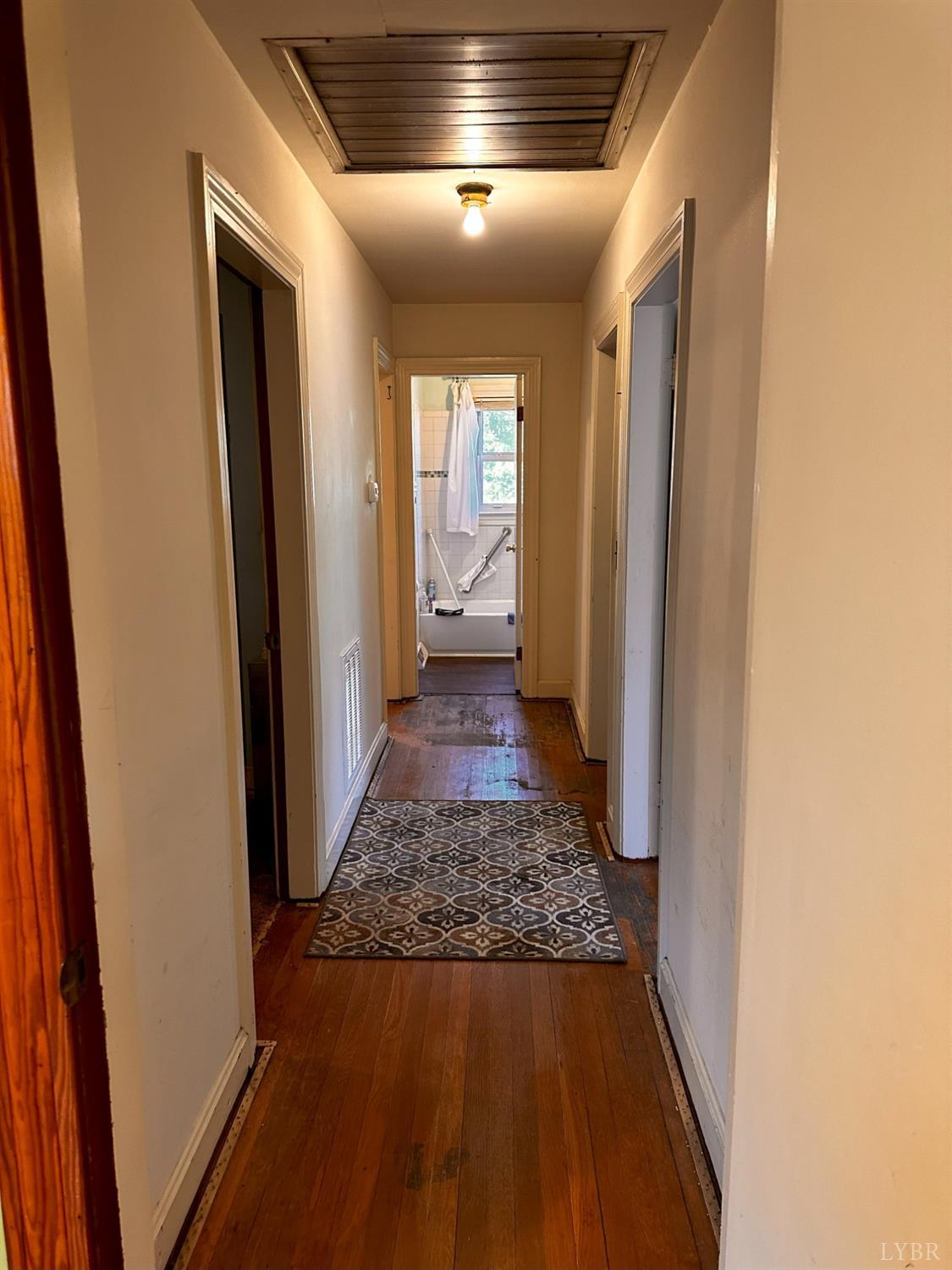 1724 Stone Mill Road Hurt, VA 24563 - Photo 18 of 37 a view of hallway with wooden floor