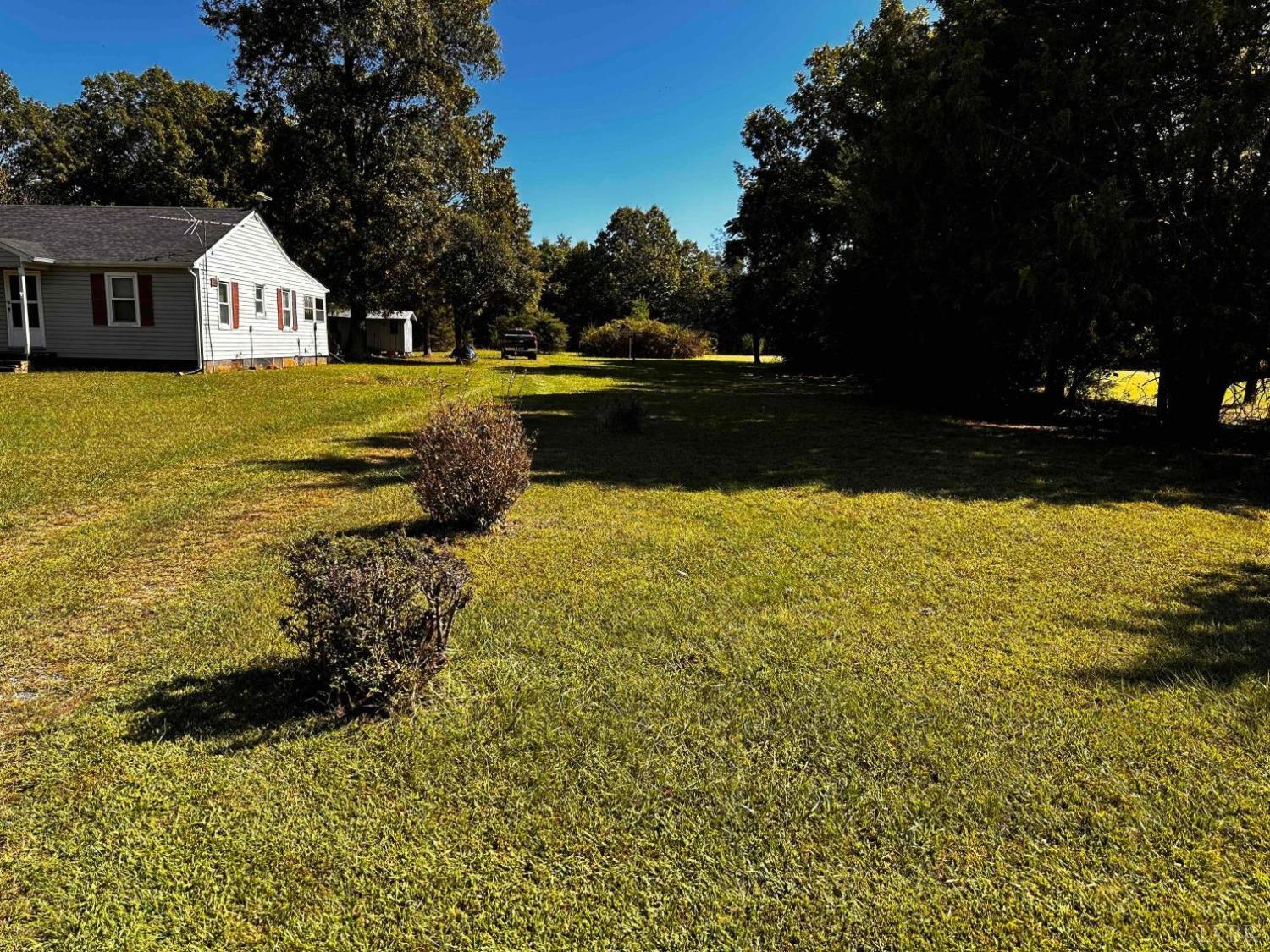 1724 Stone Mill Road Hurt, VA 24563 - Photo 3 of 37 a view of a yard with a house