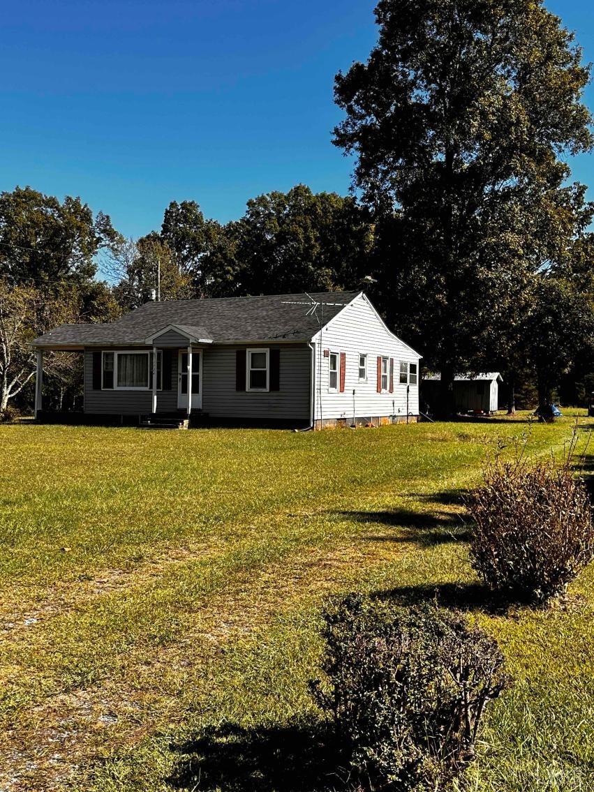 1724 Stone Mill Road Hurt, VA 24563 - Photo 5 of 37 a front view of a house with a yard