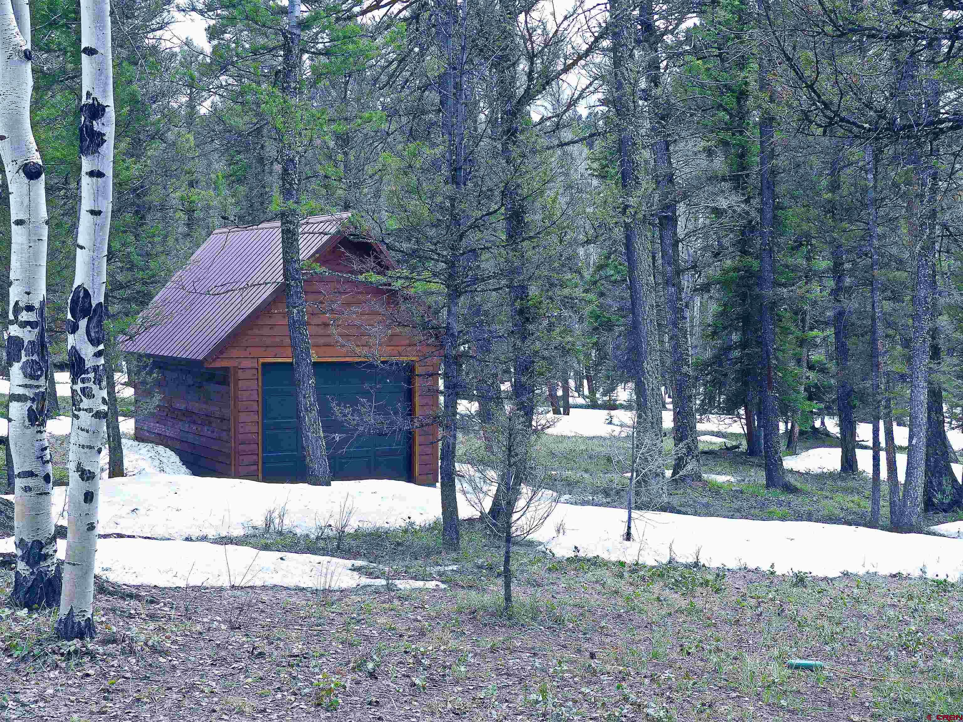 453 Ute Road Cimarron, CO 81220 - Photo 18 of 18 a view of a yard in front of a house