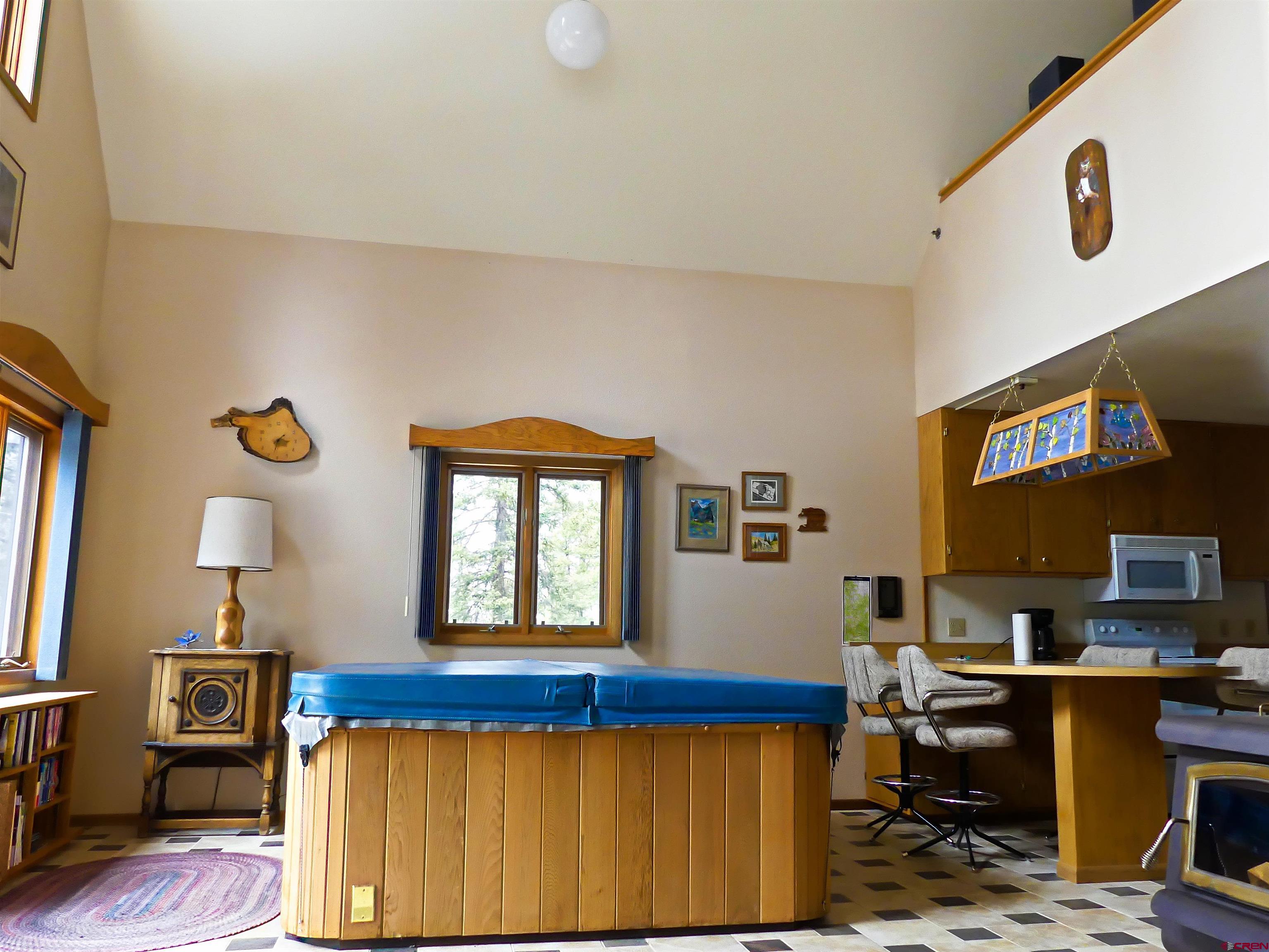 453 Ute Road Cimarron, CO 81220 - Photo 4 of 18 a view of a workspace with furniture and a window