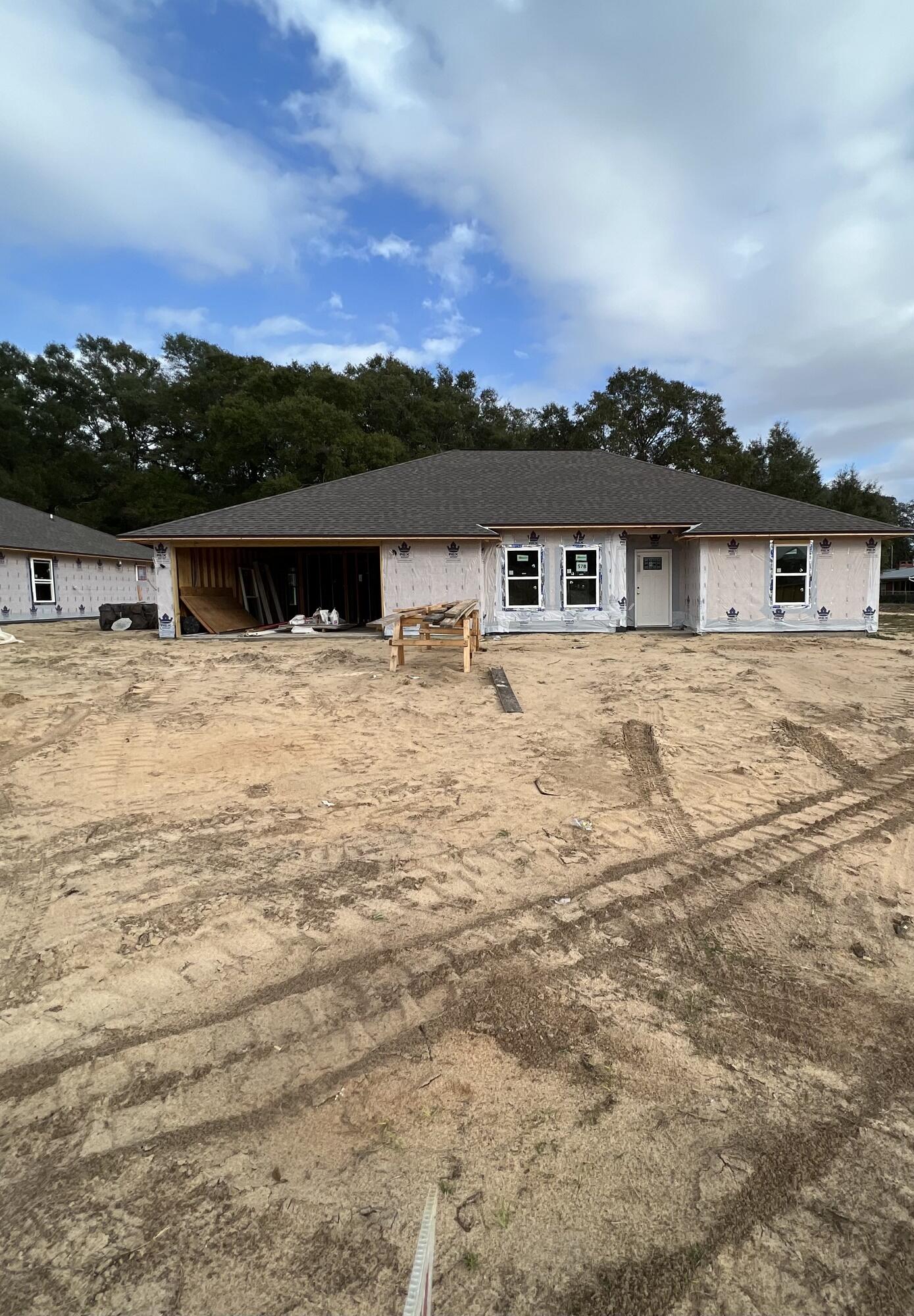 5292 Moore Loop Crestview, FL 32536 - Photo 1 of 1 a view of ocean with a large trees