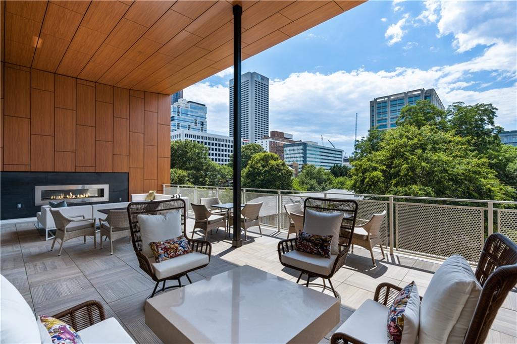 775 Juniper Street Northeast, Unit 404 Atlanta, GA 30308 - Photo 22 of 22 a view of a terrace with furniture