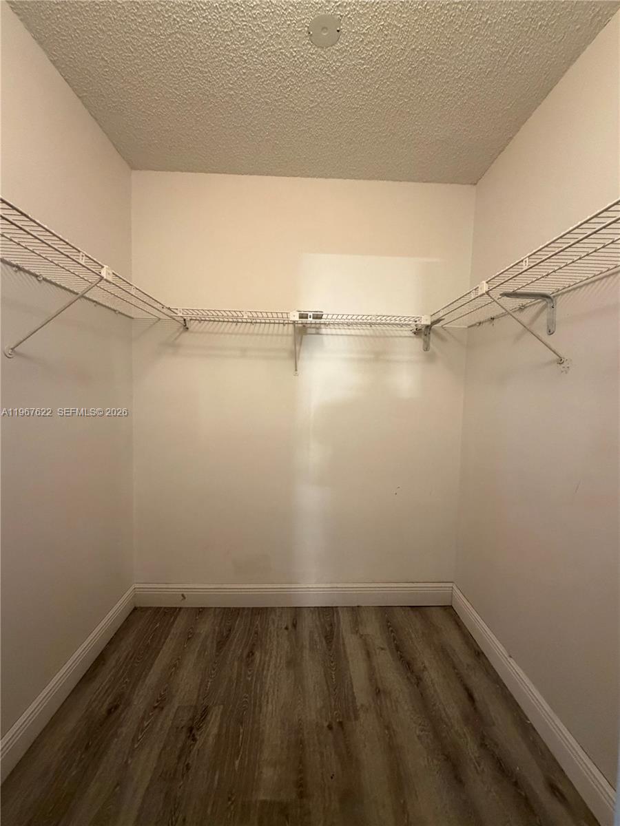 3910 Inverrary Boulevard, Unit 803B Lauderhill, FL 33319 - Photo 12 of 18 a view of a room with racks on the wall