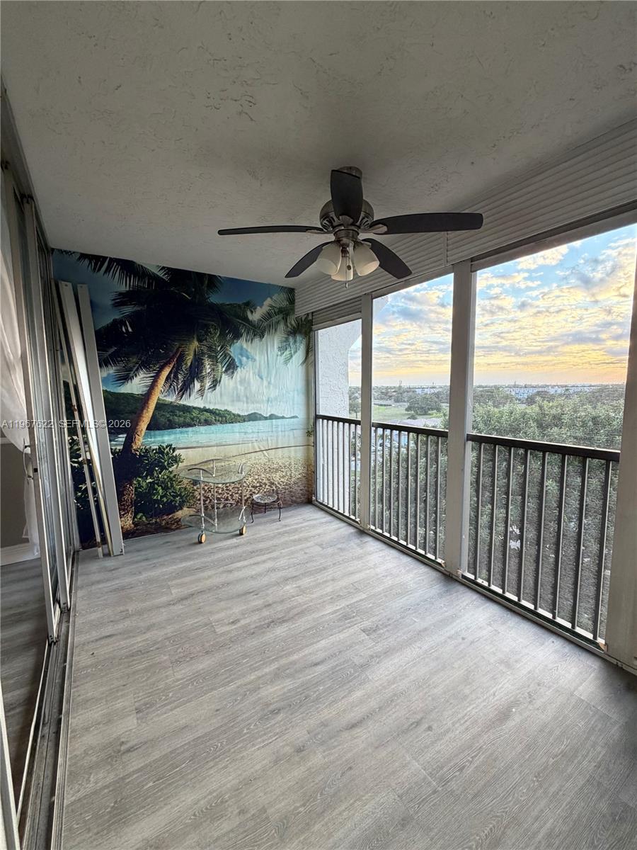 3910 Inverrary Boulevard, Unit 803B Lauderhill, FL 33319 - Photo 18 of 18 a view of an empty room with wooden floor