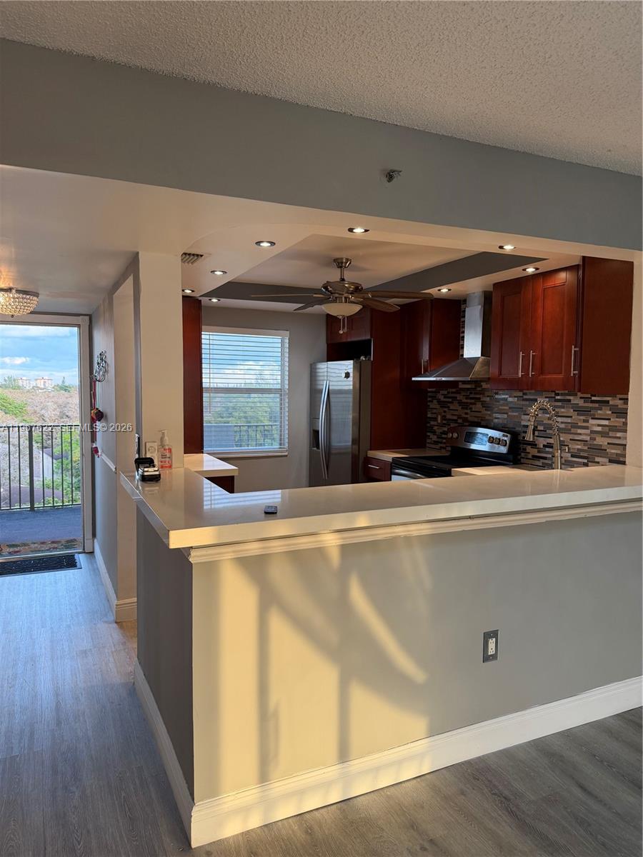 3910 Inverrary Boulevard, Unit 803B Lauderhill, FL 33319 - Photo 3 of 18 a view of a living room and kitchen