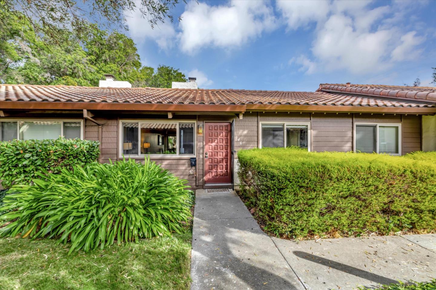 146 Brahms Way Sunnyvale, CA 94087 - Photo 1 of 24 a front view of a house with garden