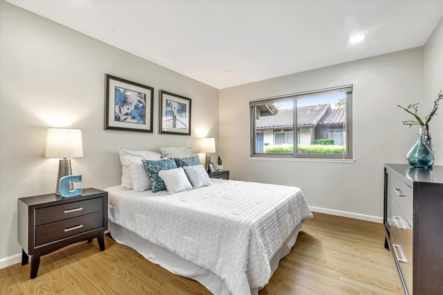 146 Brahms Way Sunnyvale, CA 94087 - Photo 12 of 24 a bedroom with bed and a window